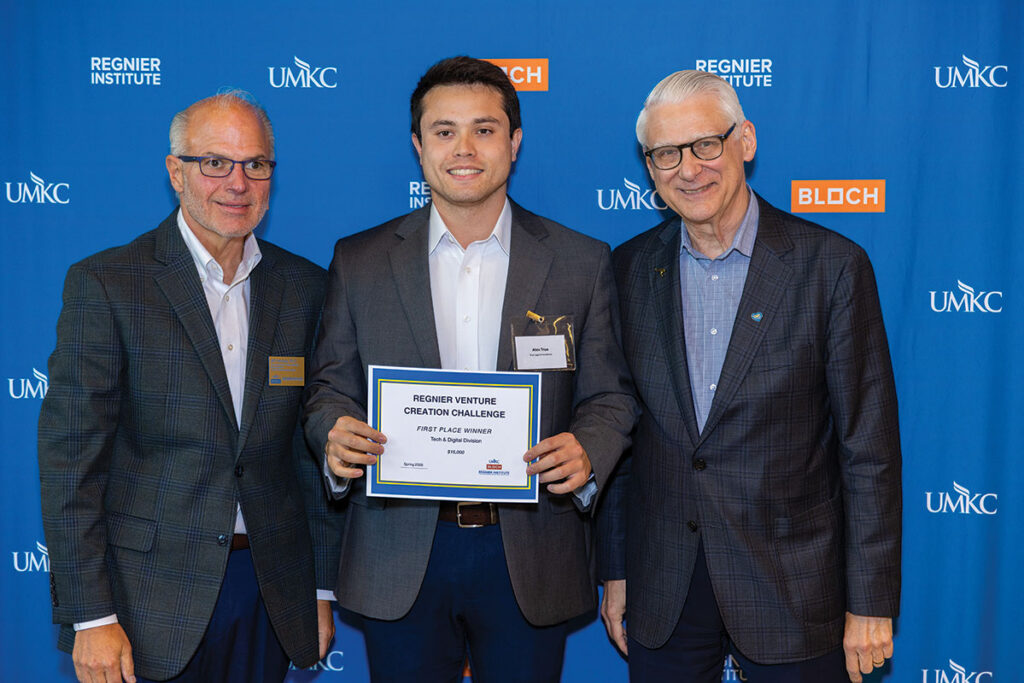 Alex True (center) won the top award in tech and digital innovation at the competition, presented to him by UMKC's Jeff Hornsby. Photography provided.
